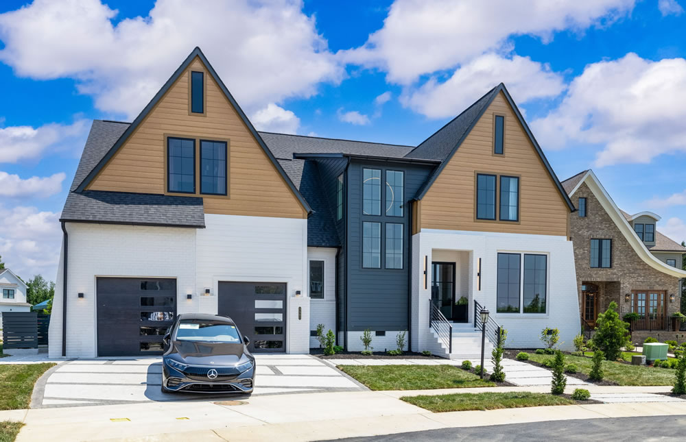 Exterior of house with car in driveway